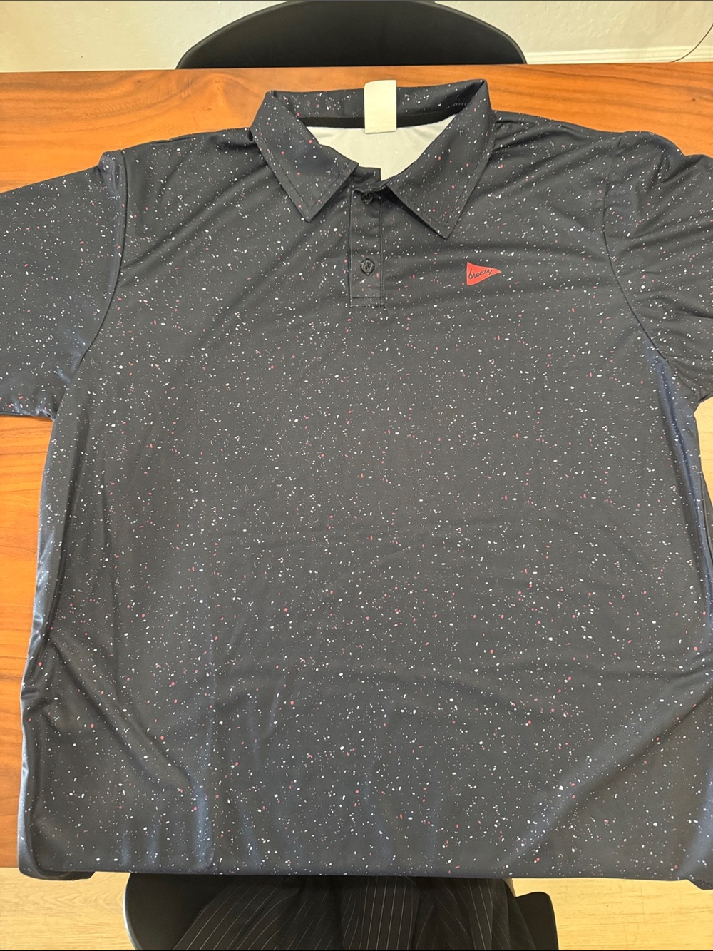 Men's Black Speckled Polo Shirt with Red Logo